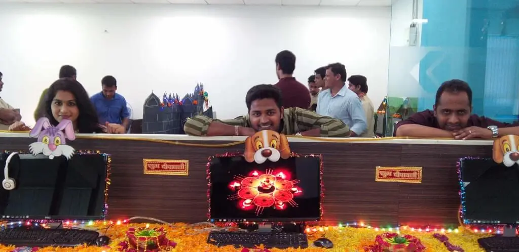 Focalworks colleagues enjoying festive decorations at the office.