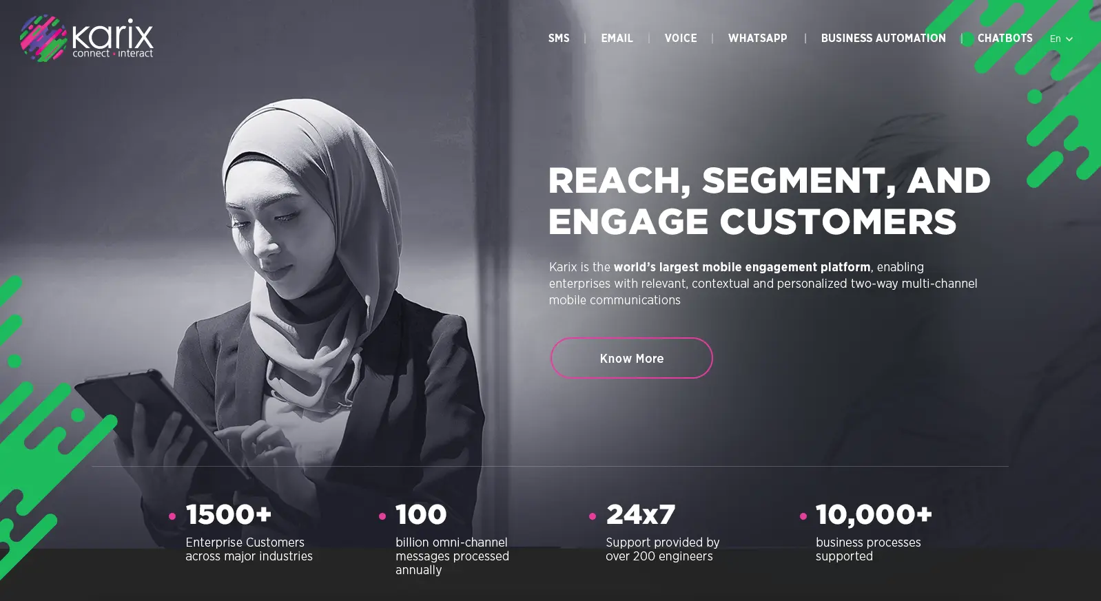 A Karix website screenshot depicts a professional woman using a computer, possibly managing customer communication strategies.