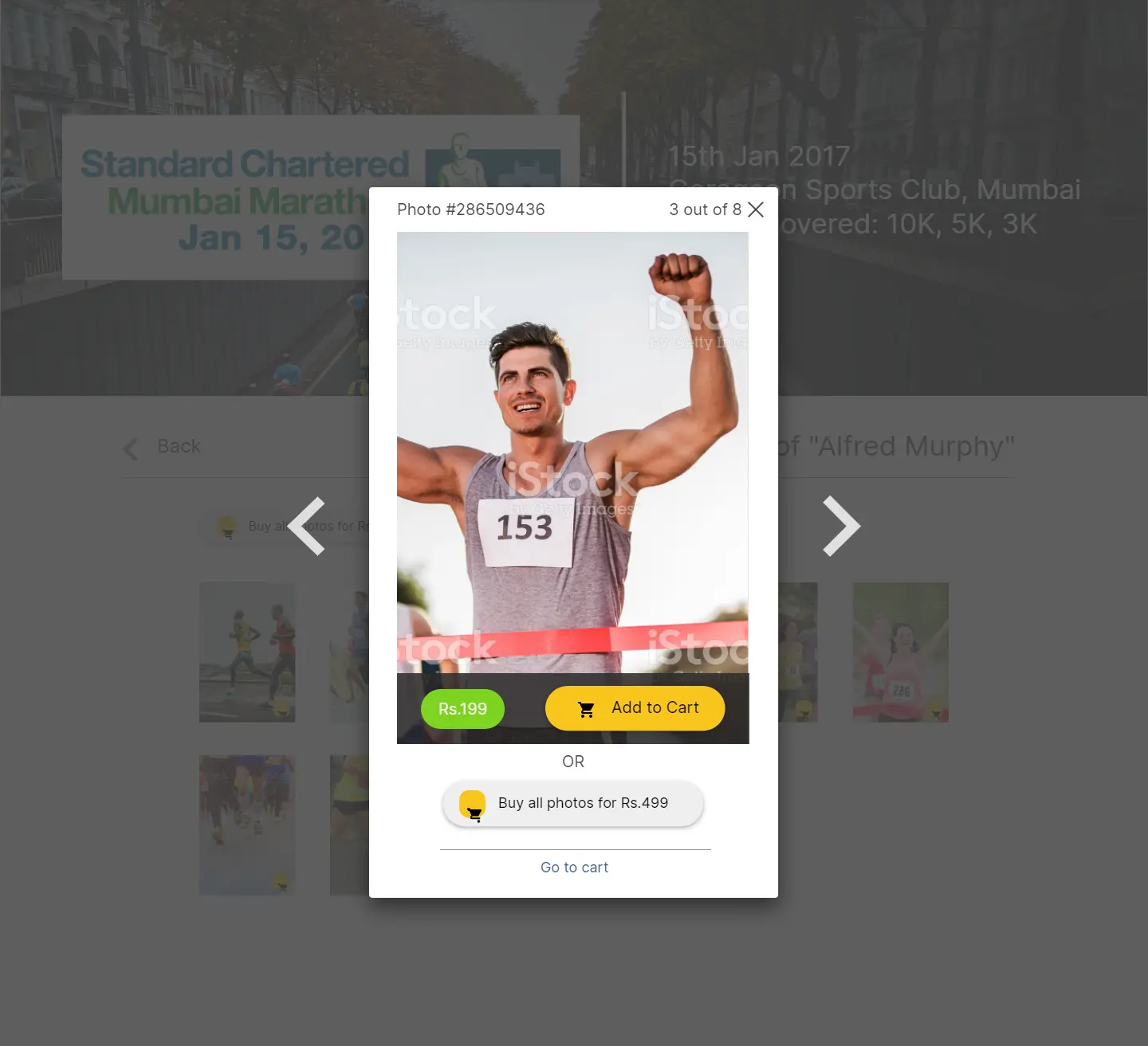 Product page image showing a runner triumphantly celebrates victory at Standard Chartered Mumbai Marathon event, option to purchase photos.